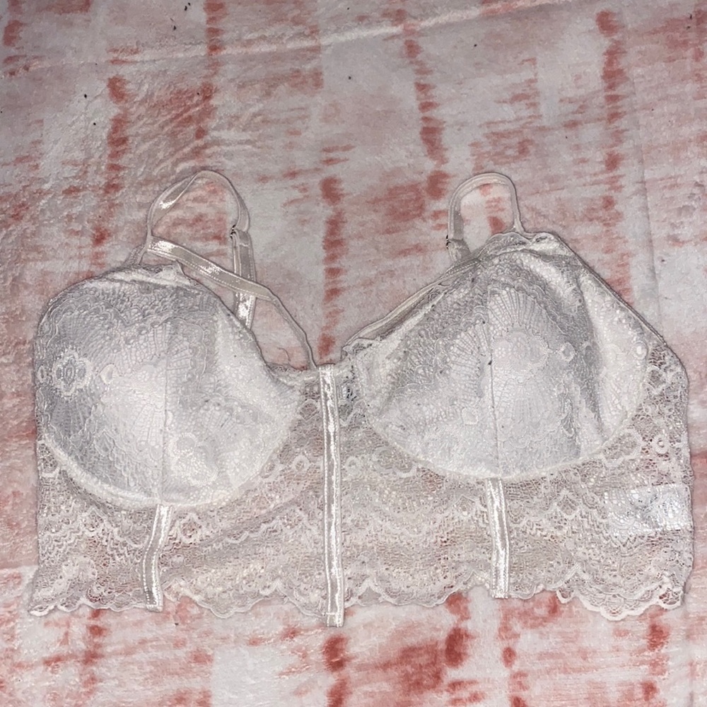 White top used 2 times has build in bra adjustable straps